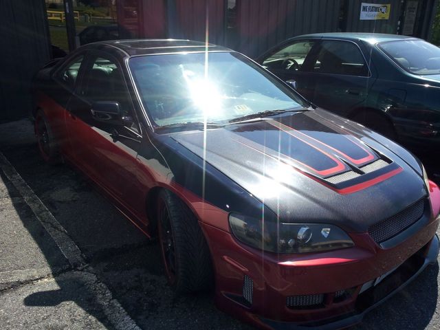 Modified sports car at mechanic shop