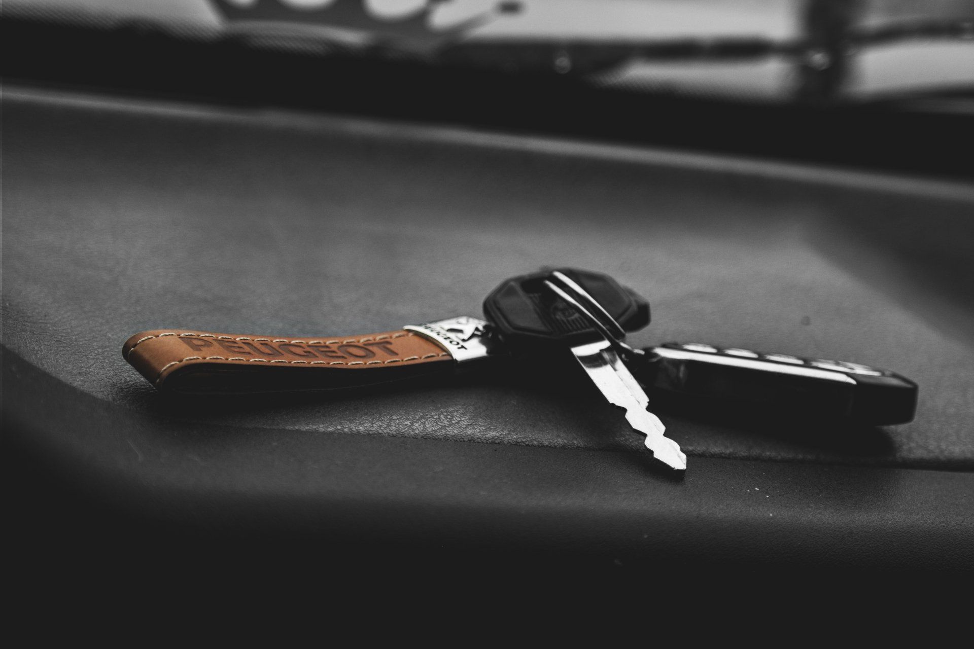 Car key on dashboard